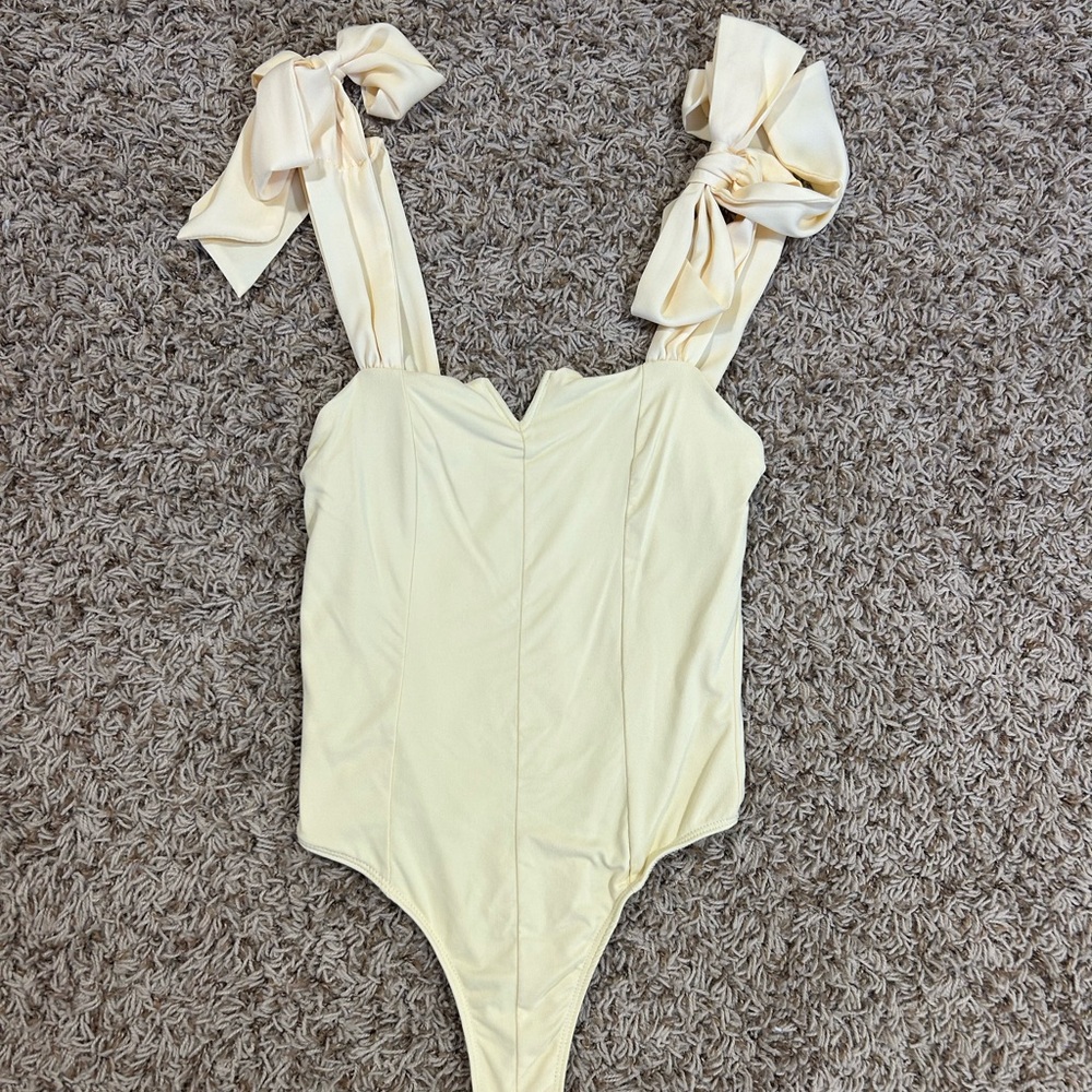 Yellow Free People Bodysuit Size small!